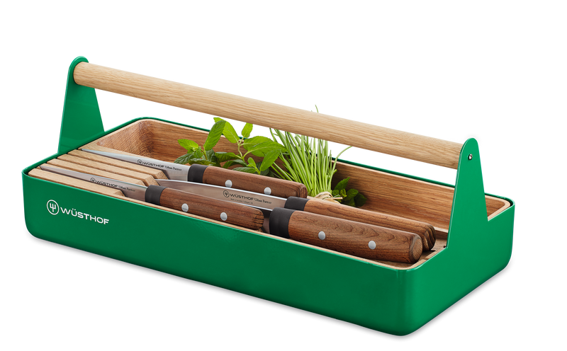 Urban Farmer Tool Basket with a vibrant green metal frame, natural wood handle, and organized space for WÜSTHOF knives and fresh herbs.
