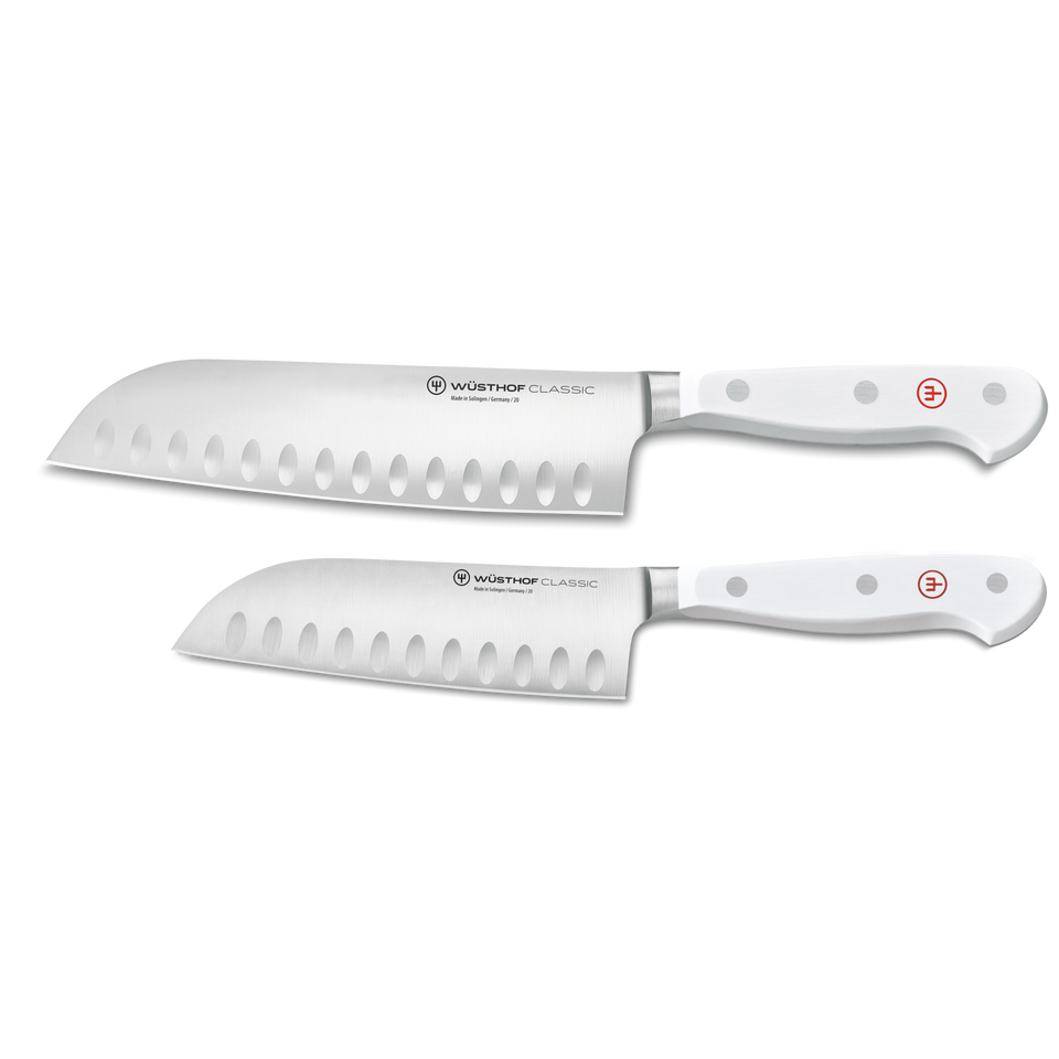 Classic 2-Piece Santoku Set featuring forged German knives with white handles and granton edges for precise, efficient cutting in the kitchen.