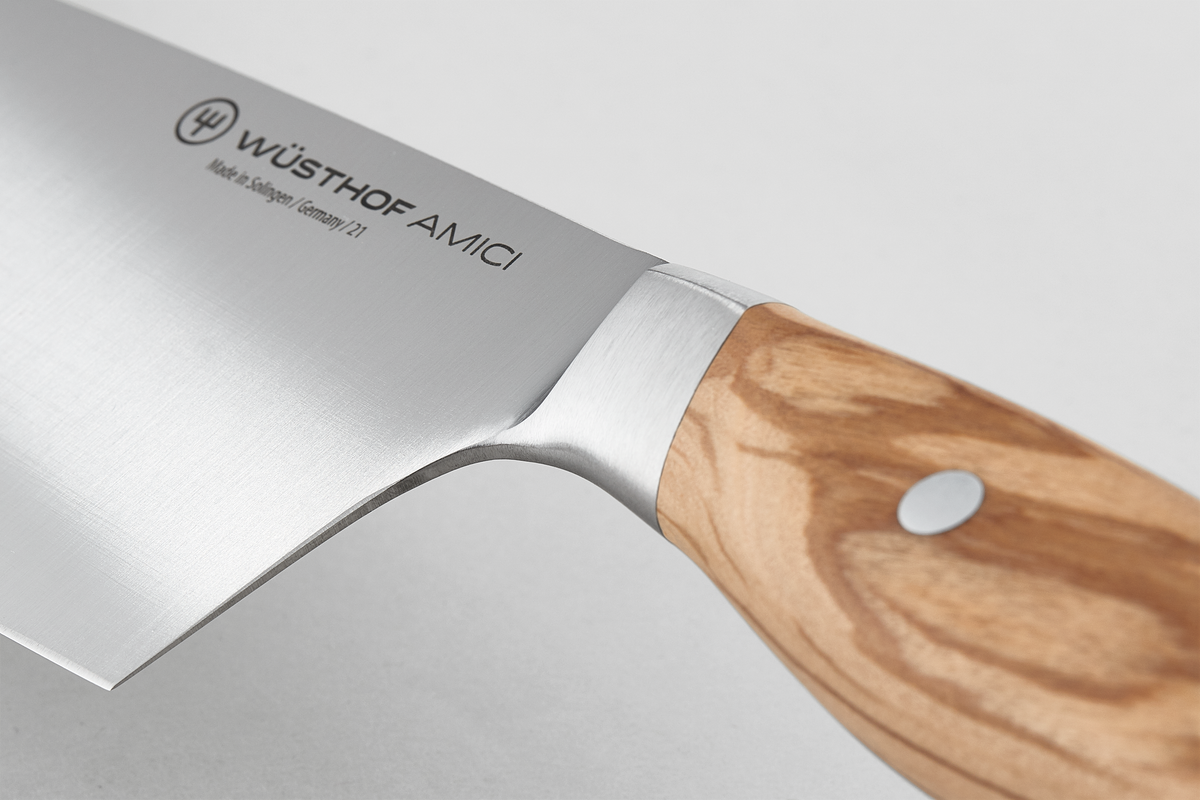 Amici 7" Hollow Edge Rotoku with polished forged stainless steel blade and smooth light wooden handle secured by a metal rivet.