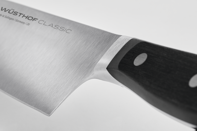 Classic 6" Half Bolster Chef's Knife with a forged German stainless steel blade and a black triple-riveted handle for durable, precise kitchen cutting.