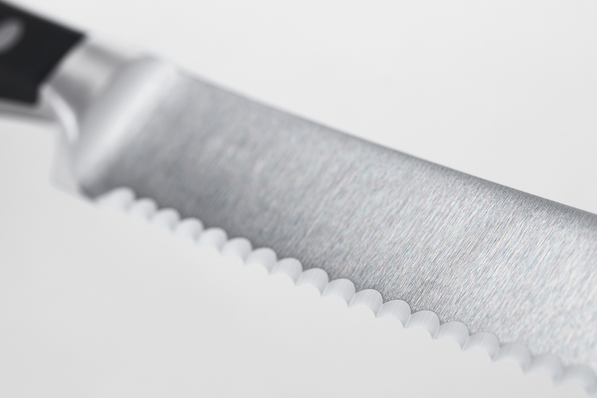 Classic 3-Piece Starter Set featuring a serrated forged German steel blade and a triple-riveted black handle designed for precise cutting and durability.