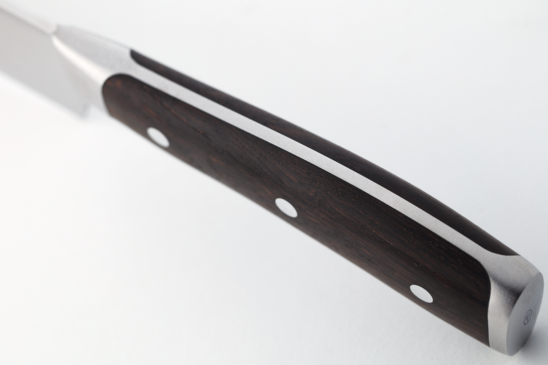 Ikon 6" Utility Knife featuring a sleek forged stainless steel blade with a dark wooden handle secured by three rivets for balanced control and durability.