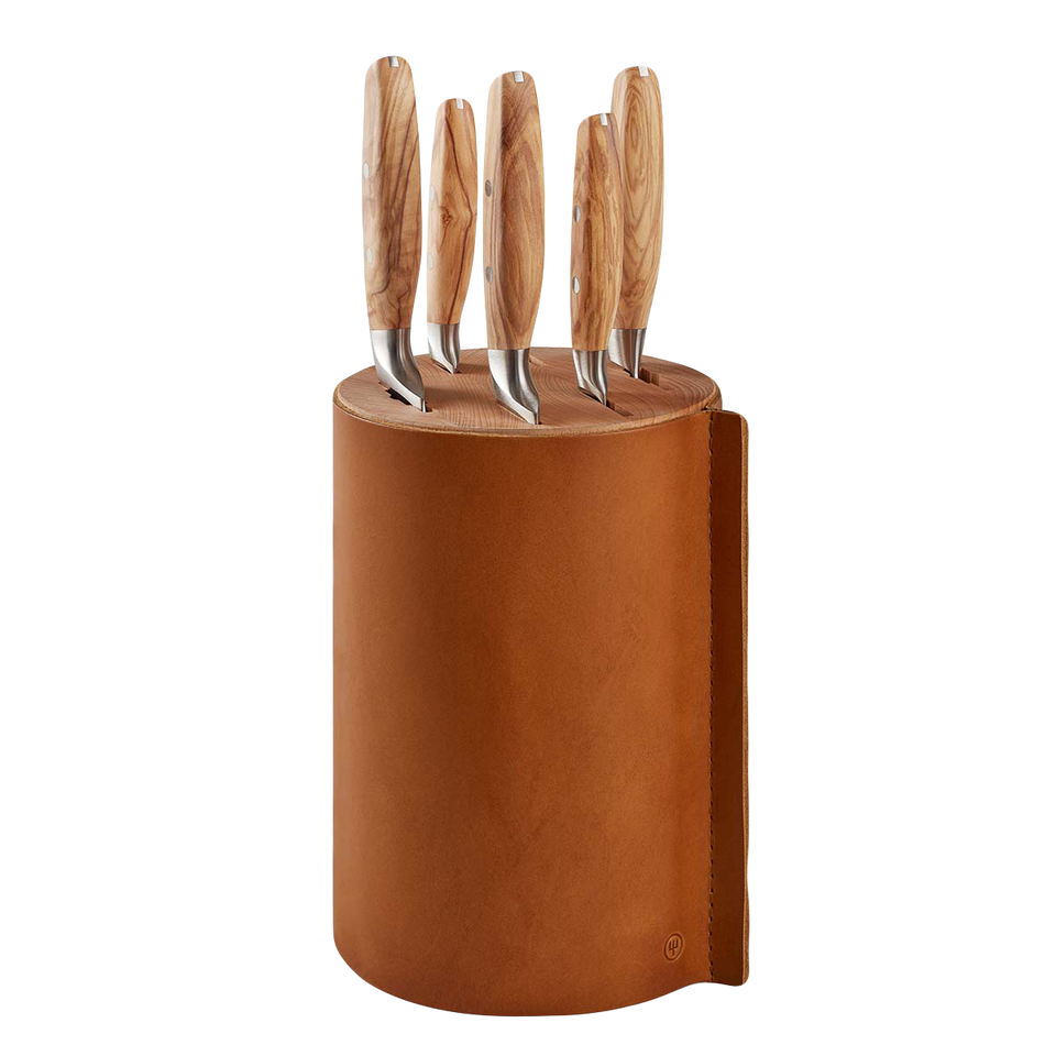 Villa 6-Piece Knife Block Set with natural wood handles and stainless steel blades, housed in a sleek cylindrical leather knife block for organized storage.